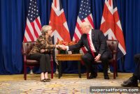 Trump, UK’s May to Discuss Huawei Ban After Firm Restricts US Contacts